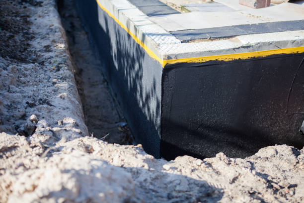 Professional Exterior Waterproofing technician working in Birmingham, AL